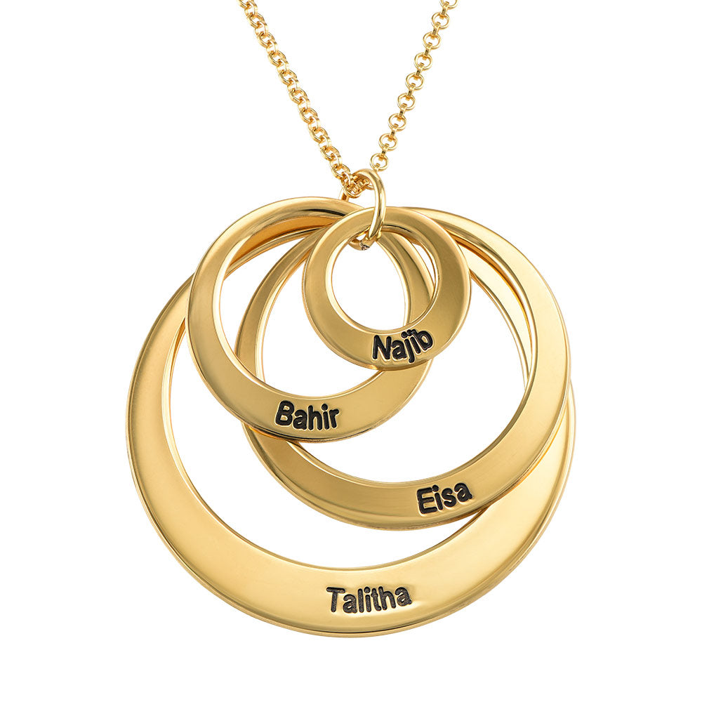 Pendant with 4 open circles and gold plated engraving