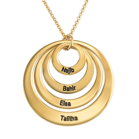 Pendant with 4 open circles and gold plated engraving