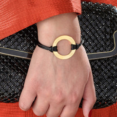 Infinity bracelet with circular pattern in gold plating