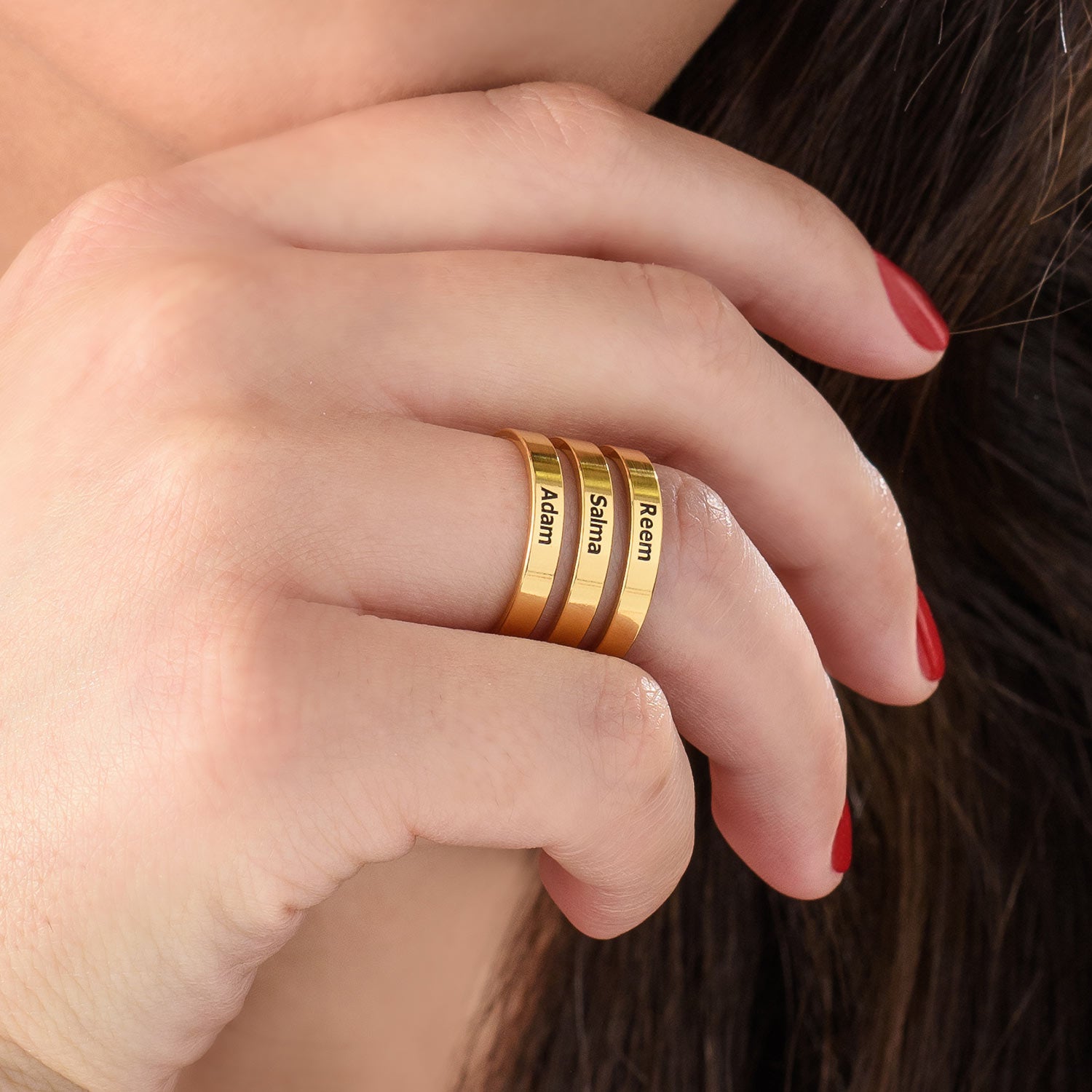 Gold plated ring with three names
